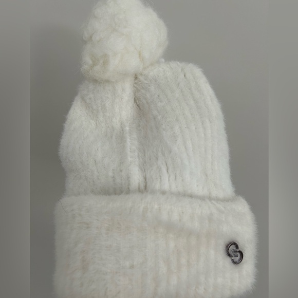 UGG Accessories - Women’s white fuzzy Pom Pom beanie